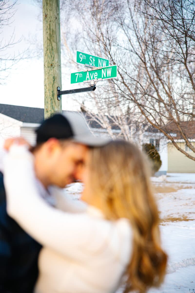 A street sign portrait featuring Janie and Caleb.